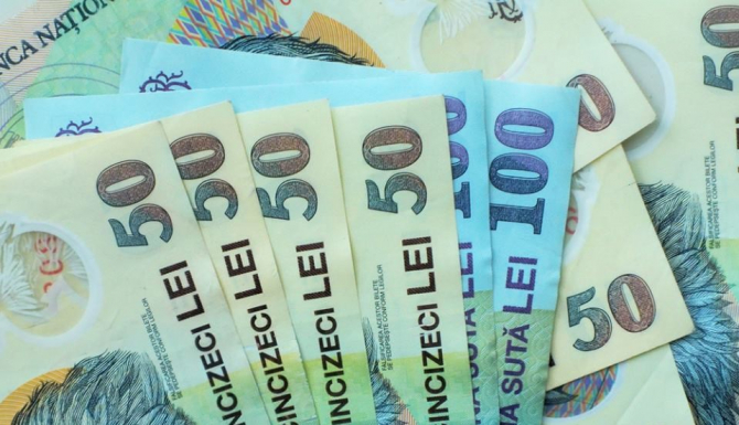 Moneda naţională s-a depreciat miercuri în raport cu euro